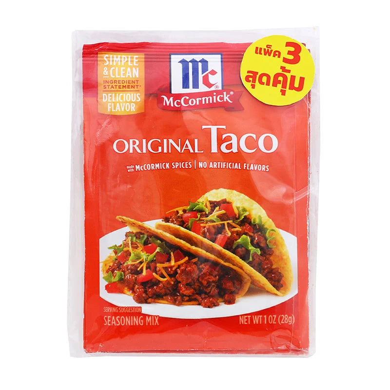 McCormick Original Taco Seasoning packets, 28g each, stacked with colorful labels and spicy seasoning content visible.