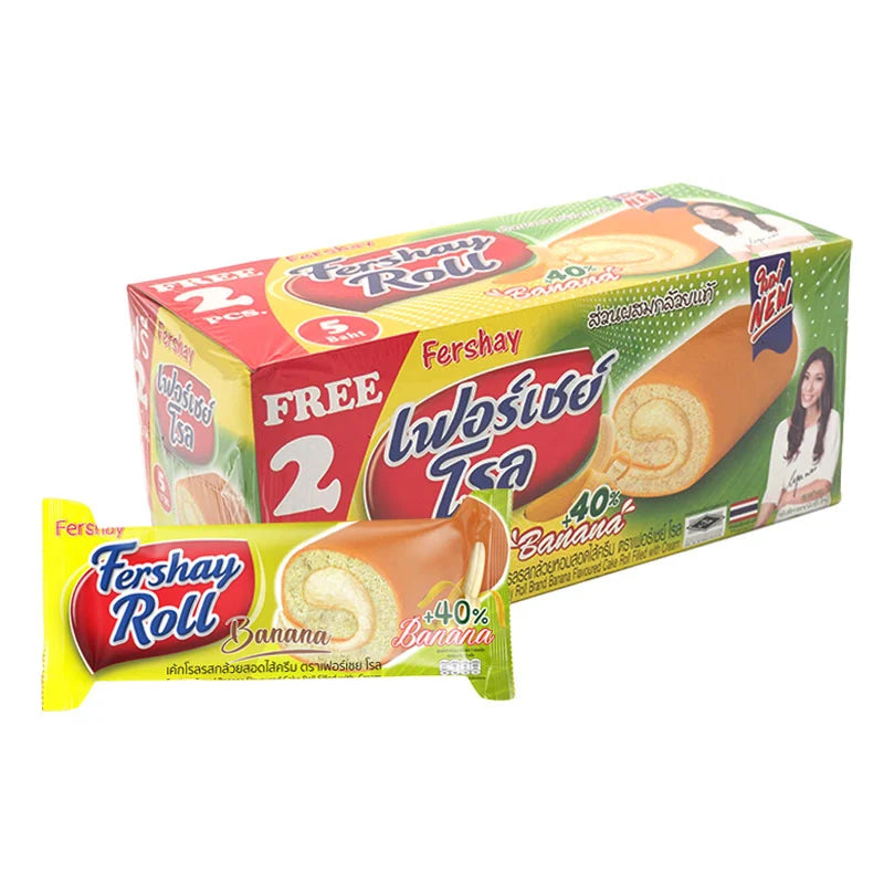 FERSHAY Banana Cake Roll 20g, 12-piece pack showing individually wrapped banana-flavored cake rolls on a tray