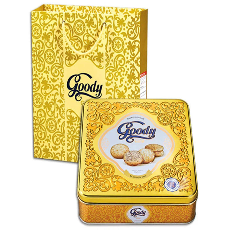 BIBICA Goody Gold square tin cookies, 450g, with golden packaging and assorted cookies visible inside.