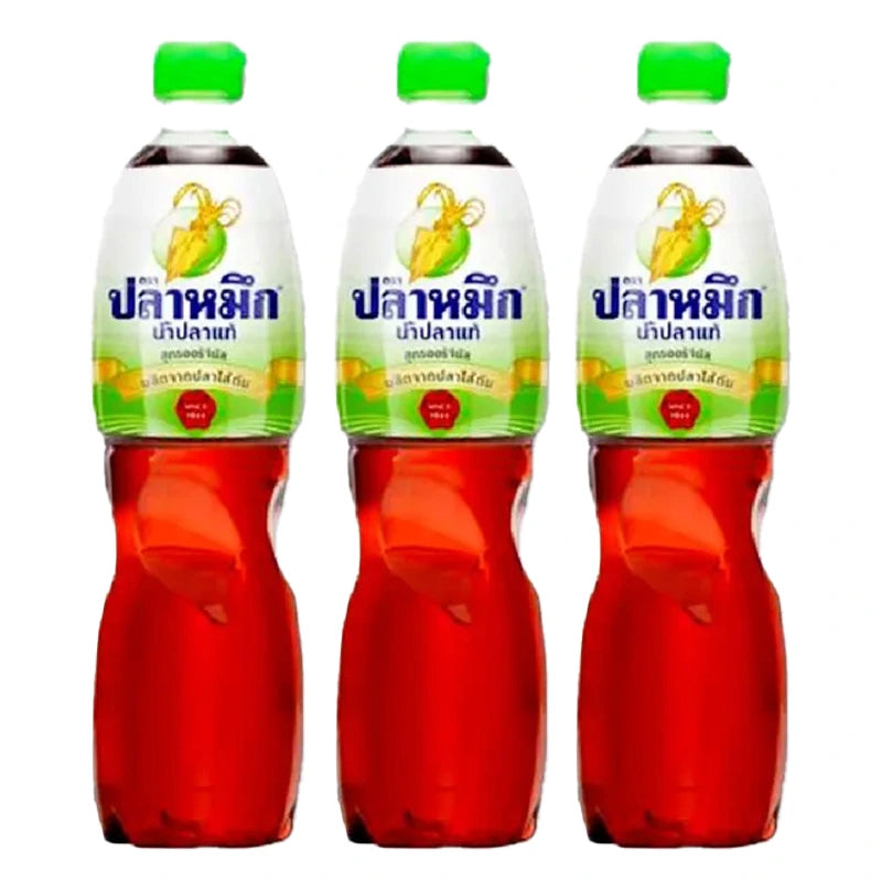 Three 700ml bottles of SQUID BRAND Fish Sauce with clear labels and dark liquid inside, arranged side by side.