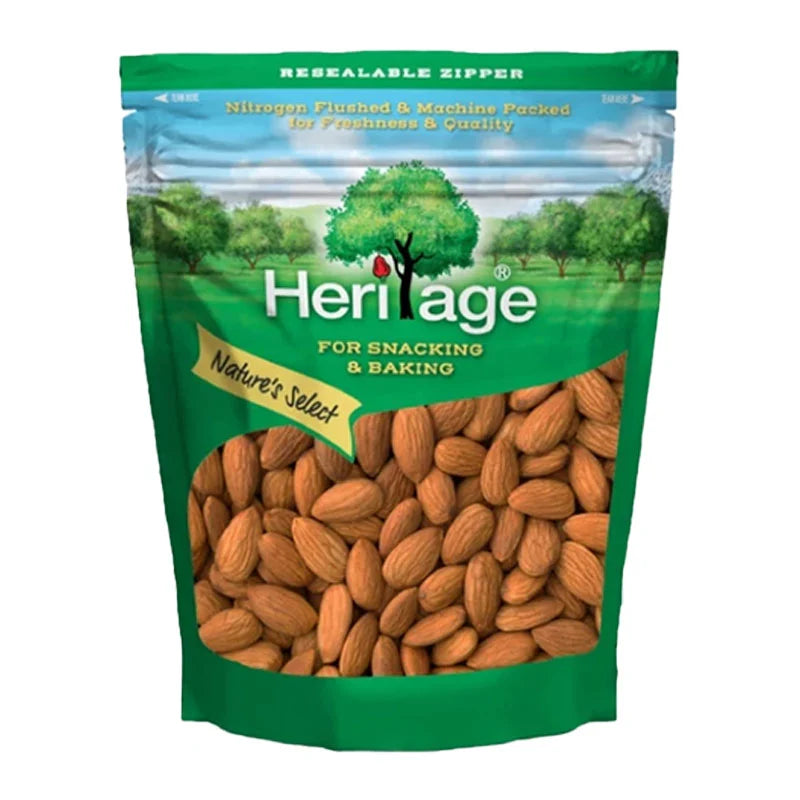 HERITAGE Whole Almond Seeds in a 500g package, showing fresh, raw almonds with light brown shells and a natural texture.