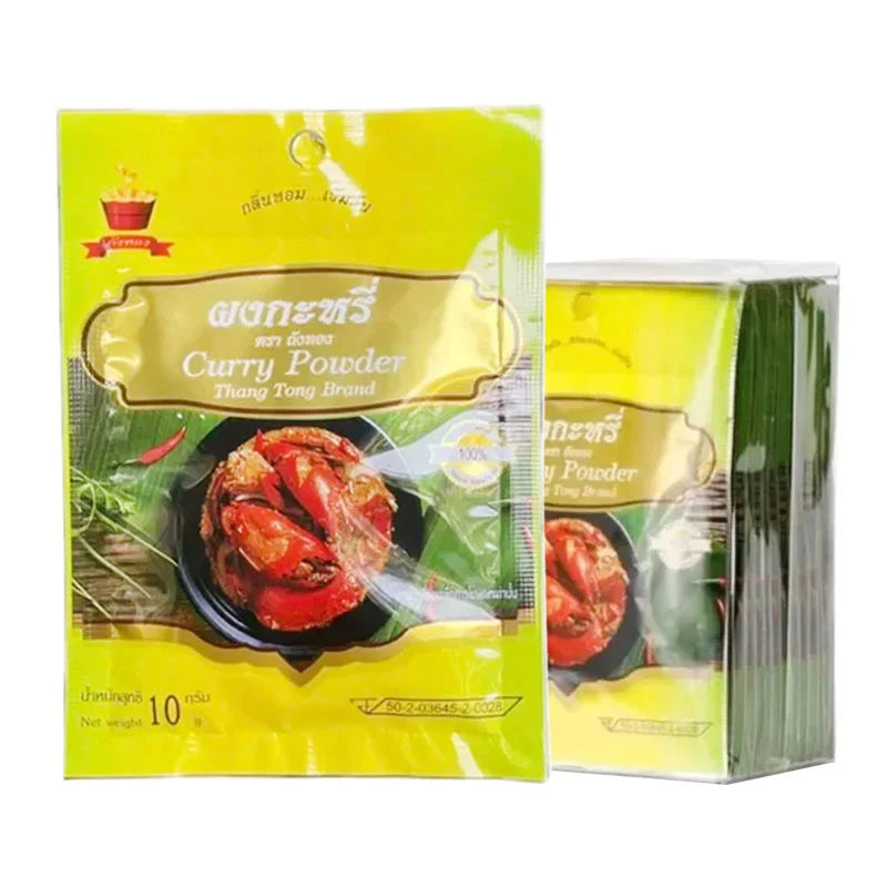 Small 10g pack of GOLDEN CHURN Curry Powder with bright yellow packaging, ideal for flavorful Indian-style cooking.