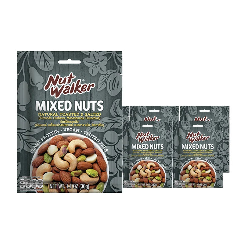 Assorted mixed nuts from NUT WALKER, natural toasted, 30g packs, displayed in a clear bowl on a wooden surface.