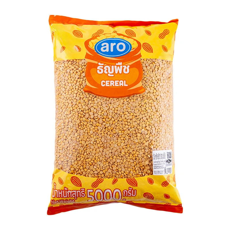 ARO Split Soybean 5 kg bag with green soybeans spilling out, showing fresh, split soybeans in a natural setting.