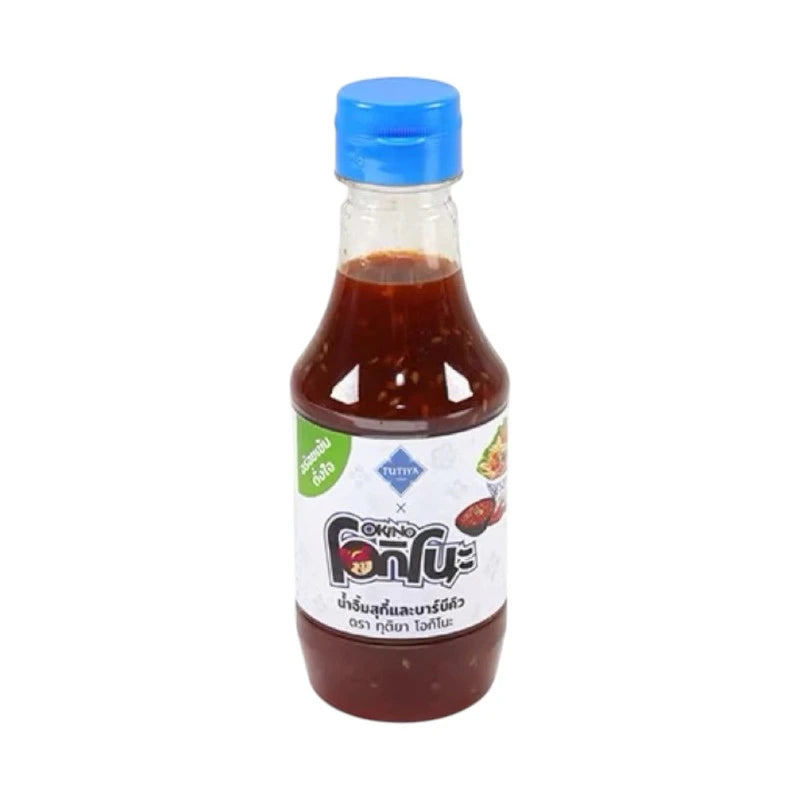 TUTIYA PICANTE Suki and barbecue dipping sauce in a jar, with a vibrant red color and fresh ingredients visible.