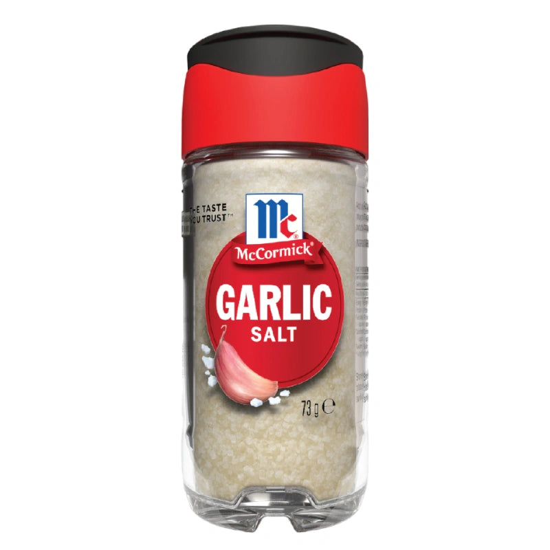 Close-up of MCCORMICK Garlic Salt jar with 73g label, showing the seasoning inside and the product packaging.