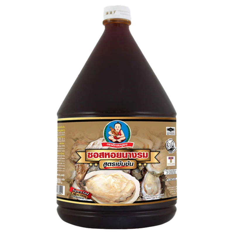 Thick oyster sauce by DEK SOM BOON in a 2.3 kg jar, showing glossy, rich sauce with oyster chunks inside.