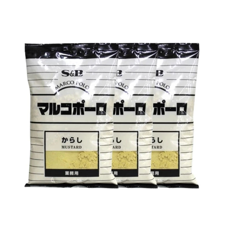 S & B Marco Polo Japanese Mustard Powder and Turmeric Powder in three 300g bags, displayed in a close-up image.