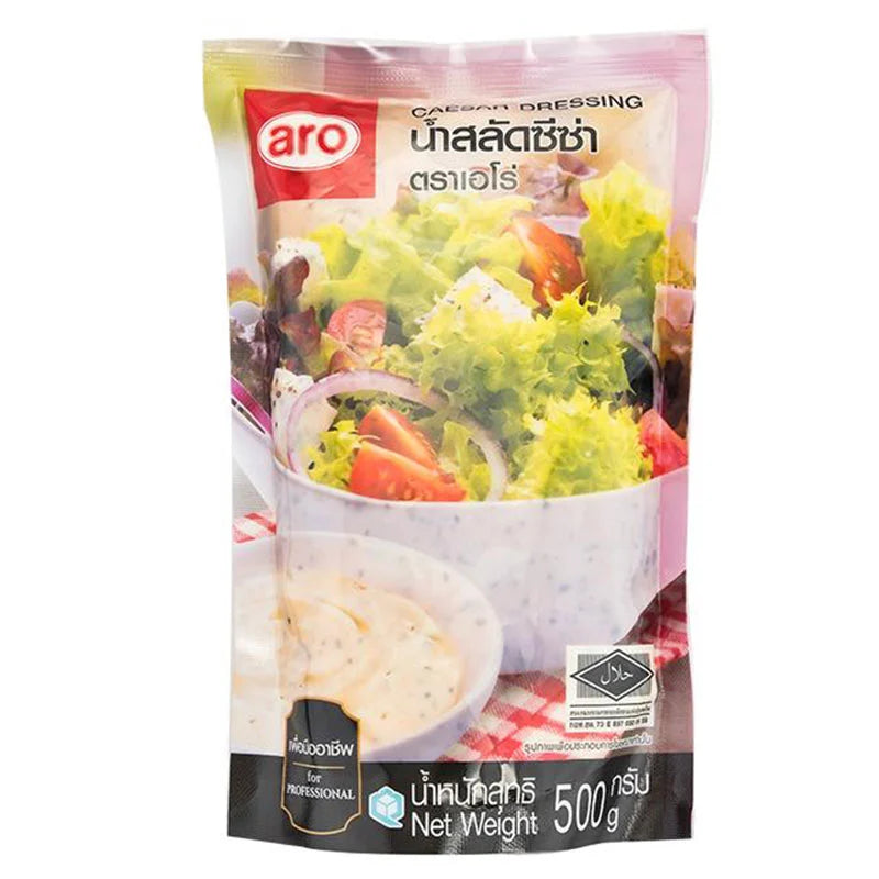 Aro Caesar salad dressing in a 500g bottle, creamy white dressing with a smooth texture, suitable for salads and dressings.