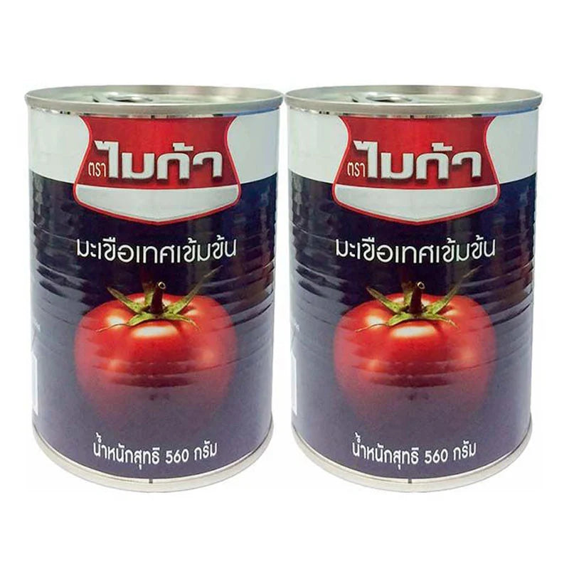 Mica Tomato Paste 560g pack, rich red tomato paste in a clear jar, showcasing its smooth texture and vibrant color.