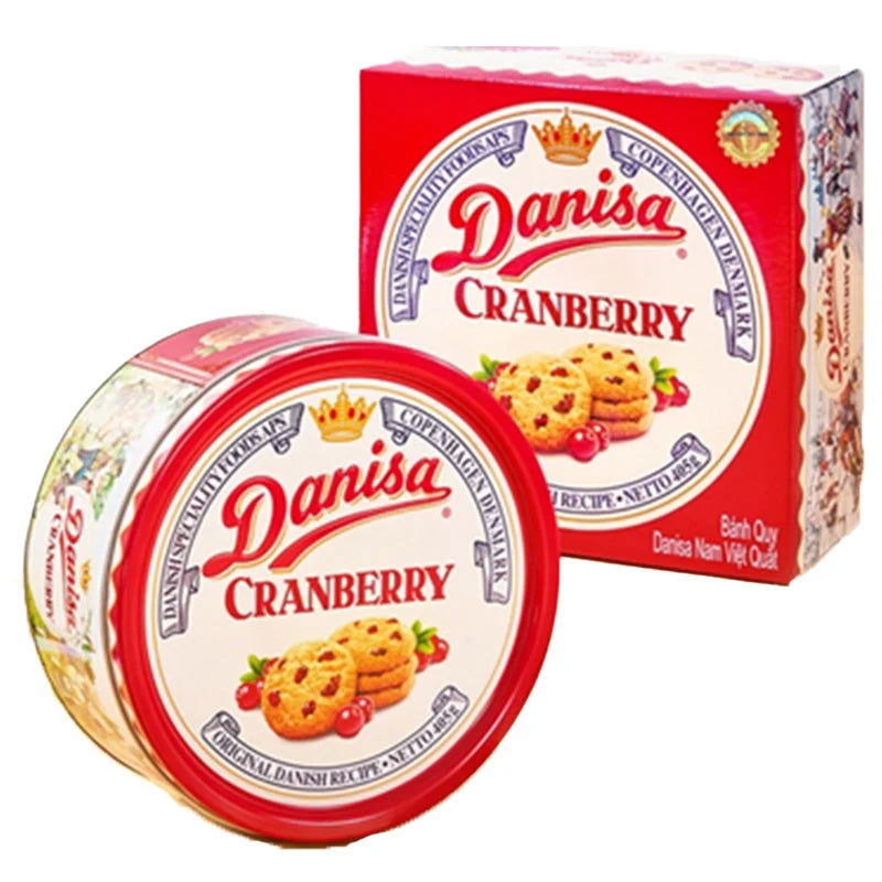 DANISA Cranberry Cookies 405g, crispy cookies with dried cranberries on a white plate, close-up view.