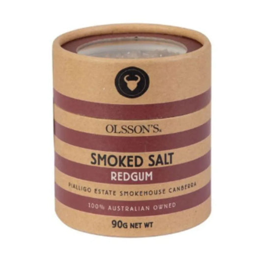 Olsson Smoked Salt in 90g jar, coarse textured, dark gray flakes, used for seasoning and enhancing flavors in cooking.