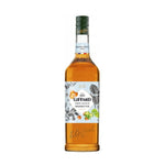 Giffard Barista Hazelnut 1L bottle, a dry grocery flavoring for coffee and desserts, with a clear label and dark liquid inside.