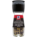 McCormick Black and White Grinder with salt and pepper shakers on a kitchen countertop