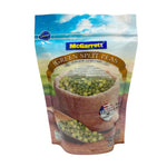 Mcgarrett Split Mung Beans 500g in a clear plastic bag, showcasing bright green mung beans ready for cooking.