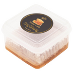 Ong Dhong Honey Come jar of sweet honey from Ong Dhong grocery brand, with golden honey visible through clear glass.