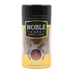 Glass of Noble Cafe Gold drink with a golden color in a clear glass, featuring a straw and a straw in a modern setting.