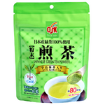 Osk Japanese green tea powder in a glass of prepared green tea, showcasing vibrant green color and fine powder texture.