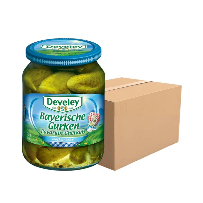 Six bottles of DEVELEY Bavarian Gherkins pickled cucumbers in 670g packs, showing fresh, crunchy pickled cucumbers in glass bottles.