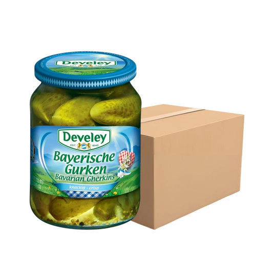 Six bottles of DEVELEY Bavarian Gherkins pickled cucumbers in 670g packs, showing fresh, crunchy pickled cucumbers in glass bottles.