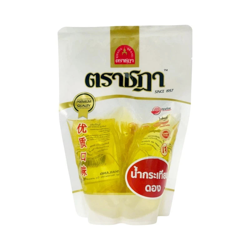 Chada Pickled Garlic Brine 300 ml in a glass bottle, featuring traditional fragrant and savory seasoning for culinary use