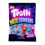 Colorful Trolli Nite Crawlers confectionery snacks with gummy worm shapes in vibrant colors and glossy texture.