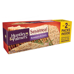 Huntley & Palmers sesame rosemary garlic confectionery snacks in a clear bowl, showing crispy, seasoned snack pieces.