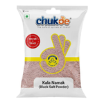 Chuk-De Black Salt in a clear container, showing dark mineral-rich salt crystals, used as a flavorful grocery seasoning.