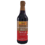 Bottle of LEE KUM KEE Premium Light Soy Sauce 500ml for cooking, in a clear glass bottle with a black screw cap.