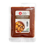 Namjai Matsaman Curry Paste 100g in a plastic jar, showing the label and cap, ideal for Thai dry grocery cooking ingredients.