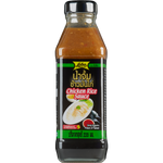 Lobo Chicken Rice Sauce in a jar, grocery product, with labels showing chicken and rice ingredients, ready for cooking.