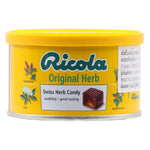 Ricola Swiss Herb Yellow Candy in a clear wrapper, featuring yellow-colored herbal confectionery snacks with Ricola branding.