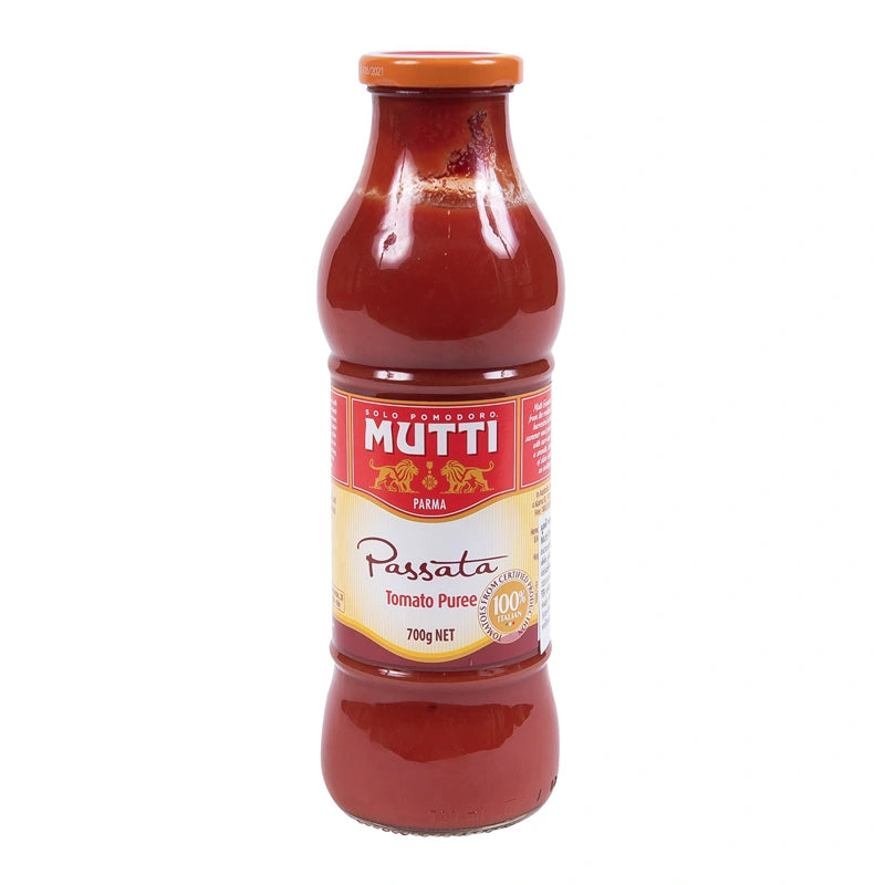 Canned MUTTI Tomato Puree 700g jar with bright red tomato puree inside, labeled with MUTTI branding and product details.