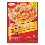 Creamy Tomyum soup from Rosdee, a grocery product with vibrant ingredients in a bowl, ready for serving.