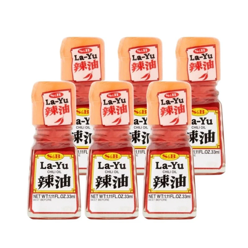 S & B La-Yu seasoned chili oil bottles with sesame, corn, and red pepper, 33ml each, arranged in a set of six.