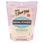 Bob's Red Mill gluten-free baking powder package, healthy grocery product in a clear, resealable bag with label showing ingredients and branding.