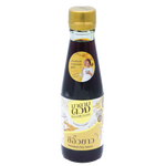 Pouring Madametuang Premium Soy Sauce into a bowl, showcasing the rich, dark color of the soy sauce from the Madametuang brand.