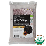 Fair D Organic Riceberry Flour in a clear bag, showcasing dark purple riceberry grains, healthy gluten-free baking ingredient.