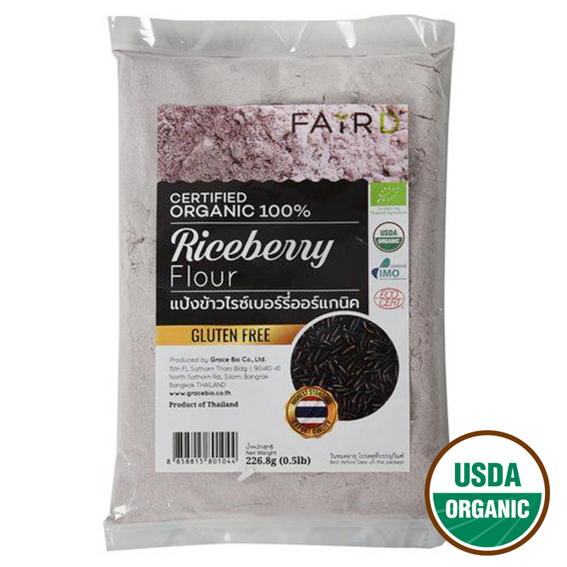Fair D Organic Riceberry Flour in a clear bag, showcasing dark purple riceberry grains, healthy gluten-free baking ingredient.