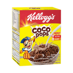 Bowl of Kellogg's Coco Pops cereal with chocolate-coated rice puffs and milk in a white bowl on a wooden table.