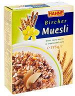 Hahne Bircher Muesli in a bowl with oats, dried fruits, and nuts, ready to serve for a healthy breakfast.