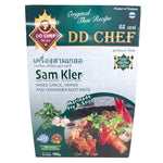 Dd Chef Samkler mixed garlic, pepper, and coriander root paste in a jar, ready for cooking, showcasing the vibrant ingredients.