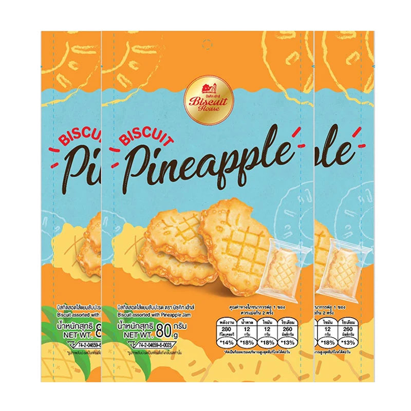 Assorted BISCUIT HOUSE biscuits with pineapple jam filling, 80g, arranged on a plate with a jar of pineapple jam in the background.