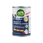 Cream of Nature's Charm Coconut Whipping Cream in a jar, showcasing its creamy texture for healthy cooking and baking.