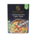 Blue Elephant Tom Yam chili paste jar, vibrant red and orange label, showcasing Thai grocery product with spicy chili ingredients.