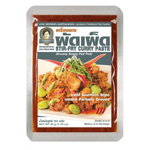 Khun Lamduan stir fry curry paste in a jar, showcasing the vibrant red chili and spice blend typical for Thai cooking.