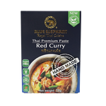 Blue Elephant Red Curry Paste in a jar, vibrant red color, Thai grocery product made for authentic cooking.