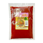 Namjai Panang Curry Paste 500g jar, Thai dry grocery product with vibrant label and traditional packaging.
