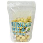 Heritage roasted salted macadamia nuts, a flavorful confectionery snack with golden-brown macadamias in a close-up image.