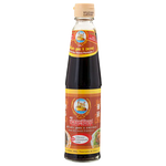 Bottle of Nguan Chiang Dark Soy Sauce Formula 1 from the grocery aisle, featuring a dark glass bottle with a label and cap.